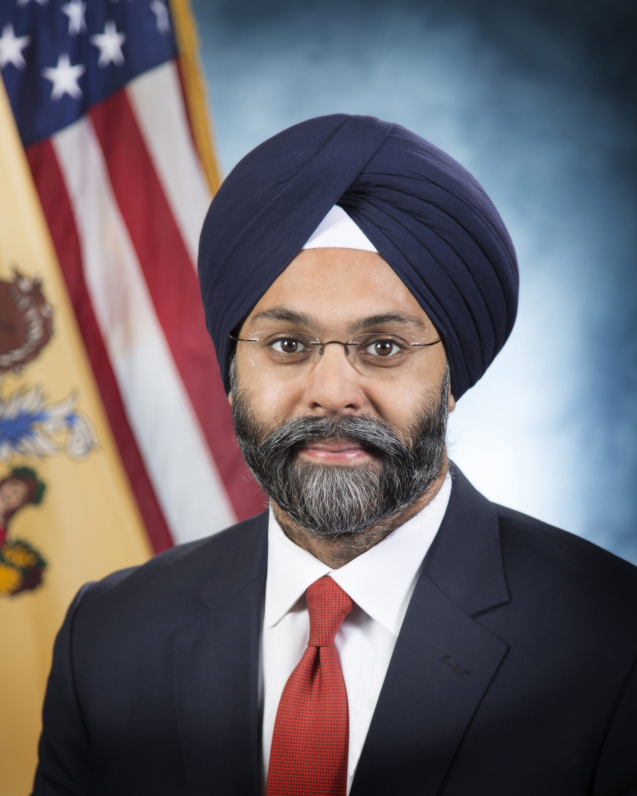 </p>
<h3 style="color:white;">Attorney General Gurbir S. Grewal</h3>
<p>Governor Philip D. Murphy announced his intention to nominate Gurbir S. Grewal to serve as New Jersey’s 61st Attorney General on December 12, 2017. He was confirmed by the New Jersey Senate and assumed the office on January 16, 2018. Since assuming office, Attorney General Grewal has focused his attention on protecting the interests of New Jersey residents by expanding affirmative litigation, strengthening police-community relations, reducing violent crime and fighting the opioid epidemic. Before becoming New Jersey Attorney General, Grewal served as Bergen County Prosecutor, the chief law enforcement officer of the most populous county in New Jersey and home to nearly 1 million residents living in 70 municipalities. As Bergen County Prosecutor, Grewal supervised a staff of 265 personnel and had supervisory authority over approximately 2,700 sworn law enforcement officers across 74 law enforcement agencies. Among other accomplishments during his tenure, he developed and implemented several creative approaches designed to tackle the heroin and opioid crisis, including “Operation Helping Hand,” a program that offers low-level drug offenders treatment options upon arrest. He also established a Community Affairs Unit, which is dedicated to assisting local departments improve police/community relations.</p>
<p>