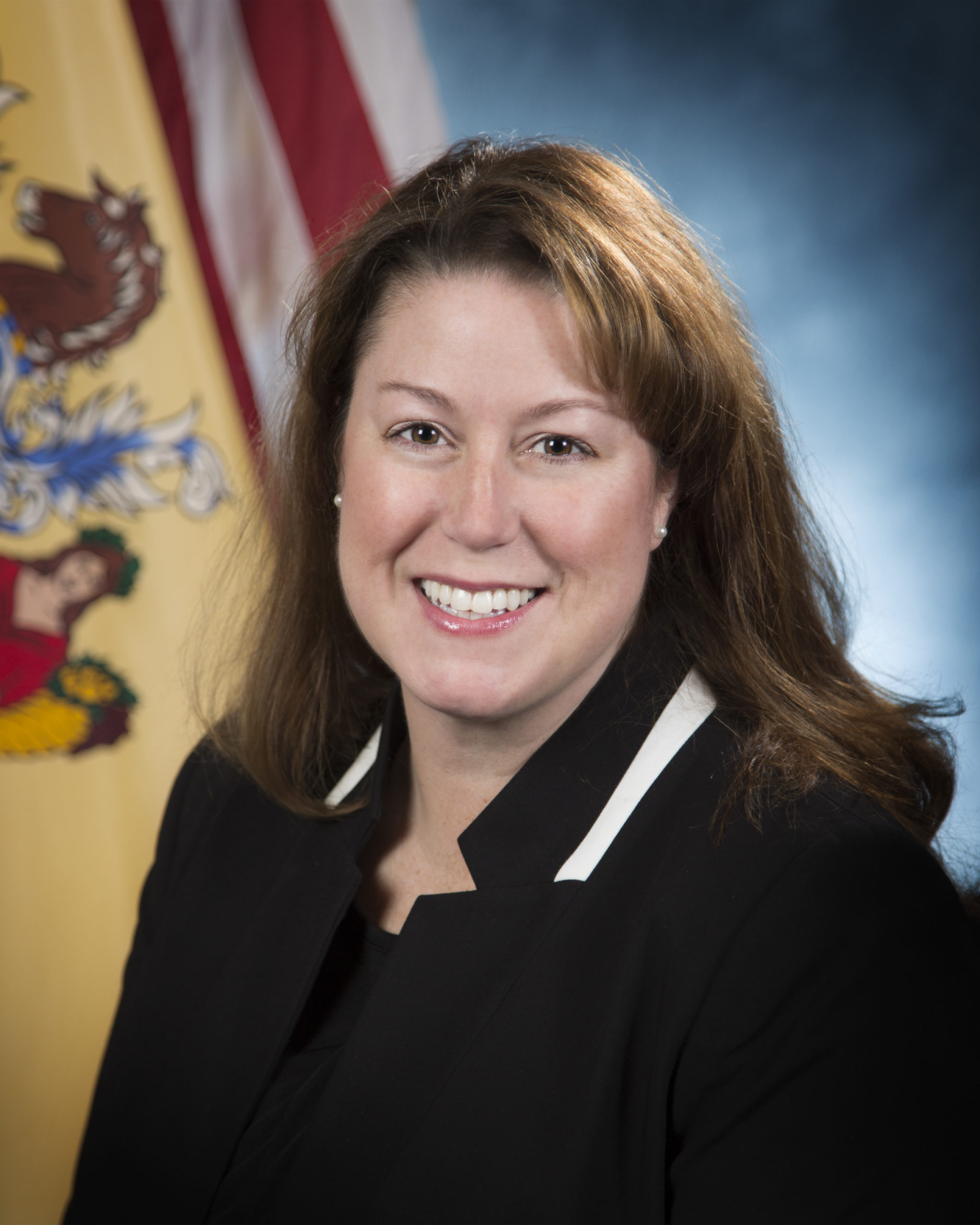</p>
<h3 style="color:white;">Jennifer Davenport</h3>
<h5 style="color:white;font-style:italic;">First Assistant Attorney General, Principal Law Enforcement Advisor</h5>
<p>